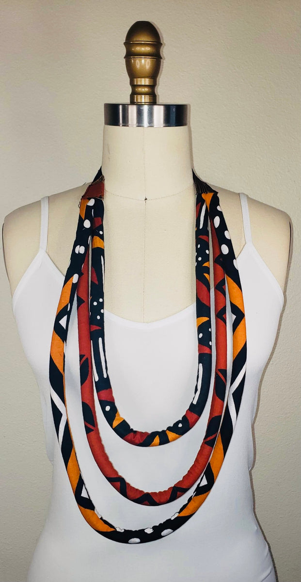 Black & orange striped rope necklace - pop-a-porter